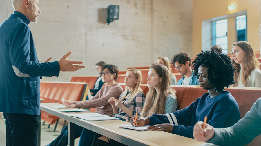 Professor talking to class of students